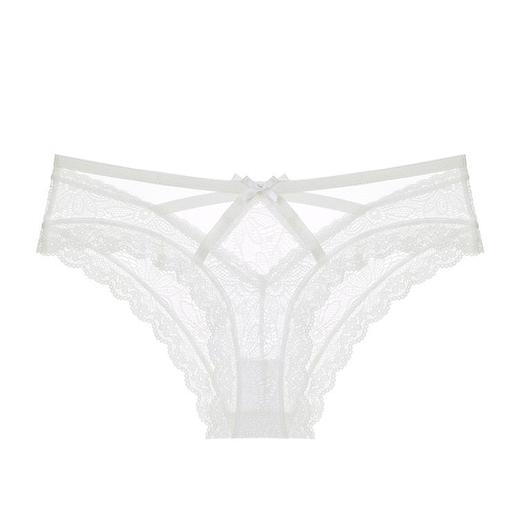 Tanga dentelle et ficelles blanc avec un petit noeud