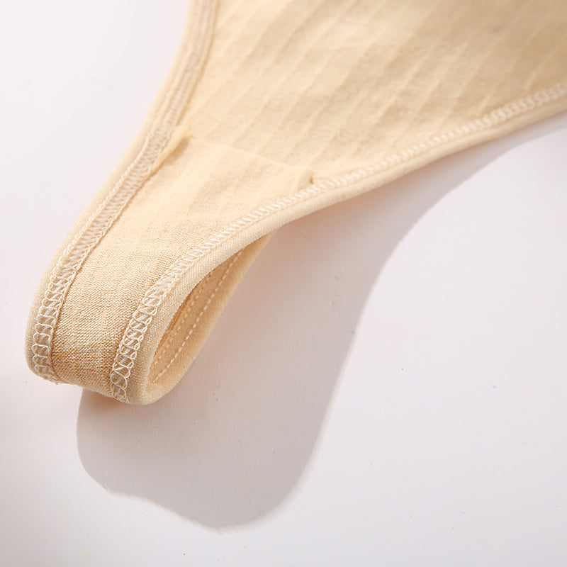 Doublure en coton d'un string beige pour femme