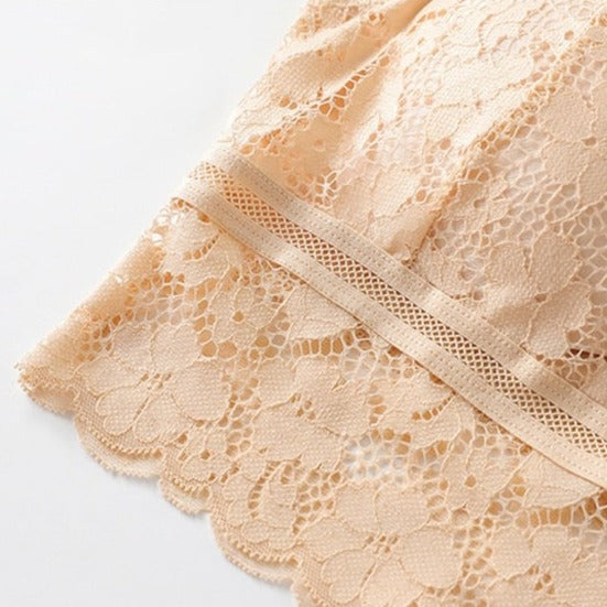 Tissu dentelle d'une bralette beige