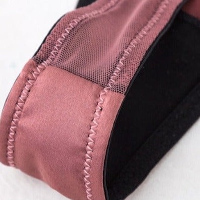 Doublure en coton d'un string bondage rose pour femme