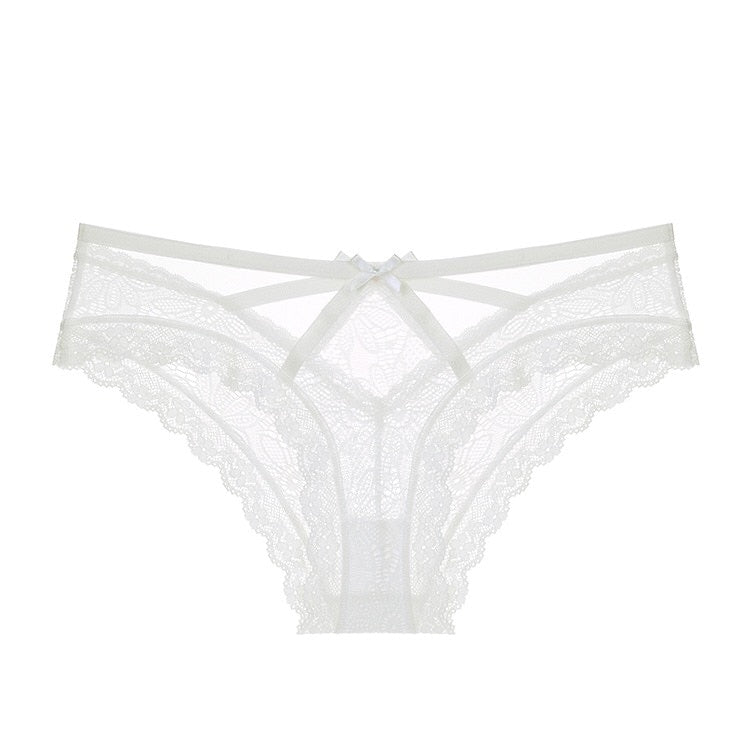 Tanga dentelle et ficelles blanc avec un petit noeud