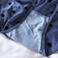 Doublure d'une culotte ruban en dentelle bleue sexy