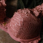 Bonnet d'un soutien-gorge rose en dentelle sexy